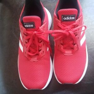 Youth boys Adidas shoes red.